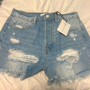 Size small Fits more like a medium brand new